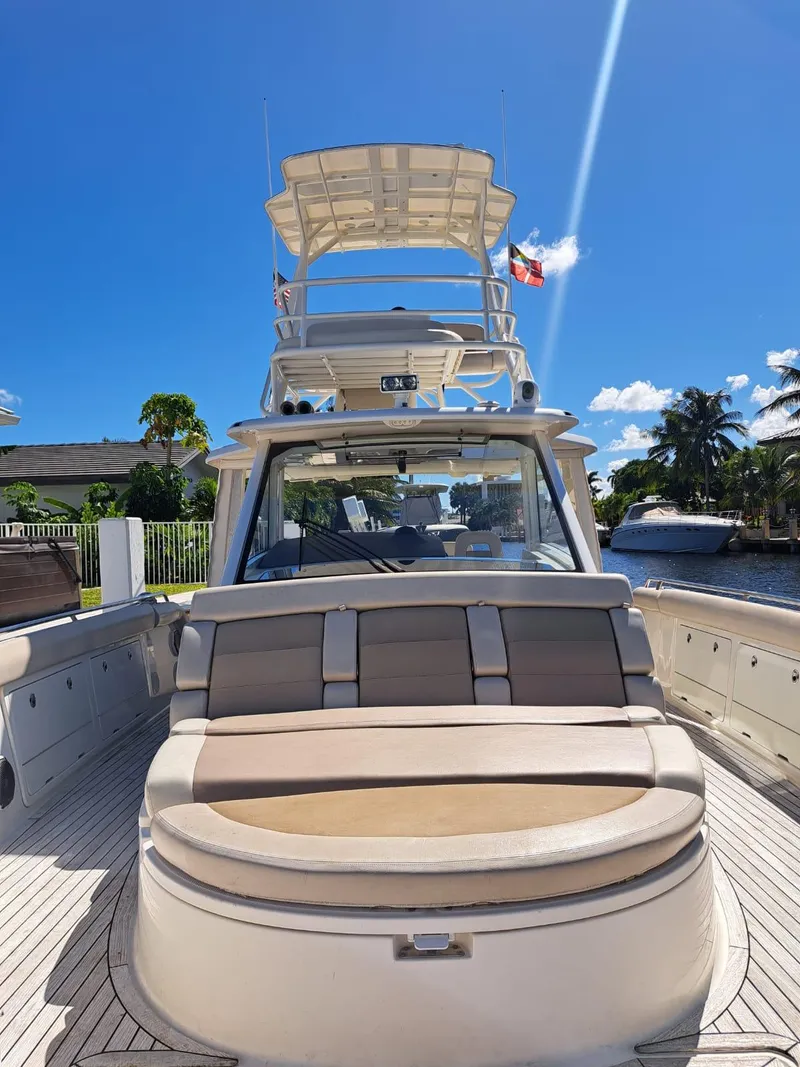 Slide: The Image of 2016 Boston Whaler 420 Outrage boat with spacious seating and dual helm stations. - 10