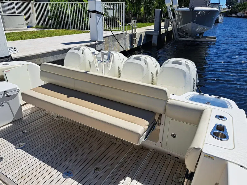 Slide: The Image of 2016 Boston Whaler 420 Outrage boat with outboard engines and rear seating. - 18