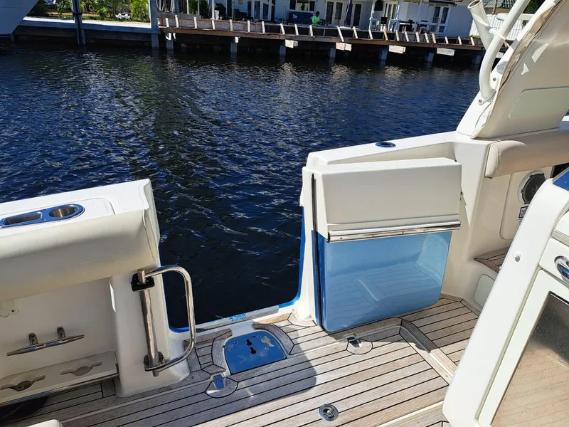 Slide: The Image of 2016 Boston Whaler 420 Outrage boat deck with water view. - 20