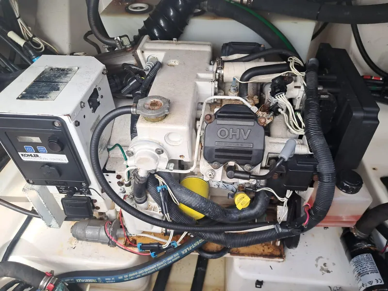 Slide: The Image of Engine compartment of a 2016 Boston Whaler 420 Outrage boat. - 34