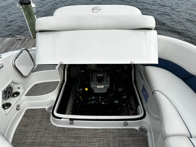 Slide: The Image of 2016 Crownline 285 SS boat engine compartment with open hatch. - 20