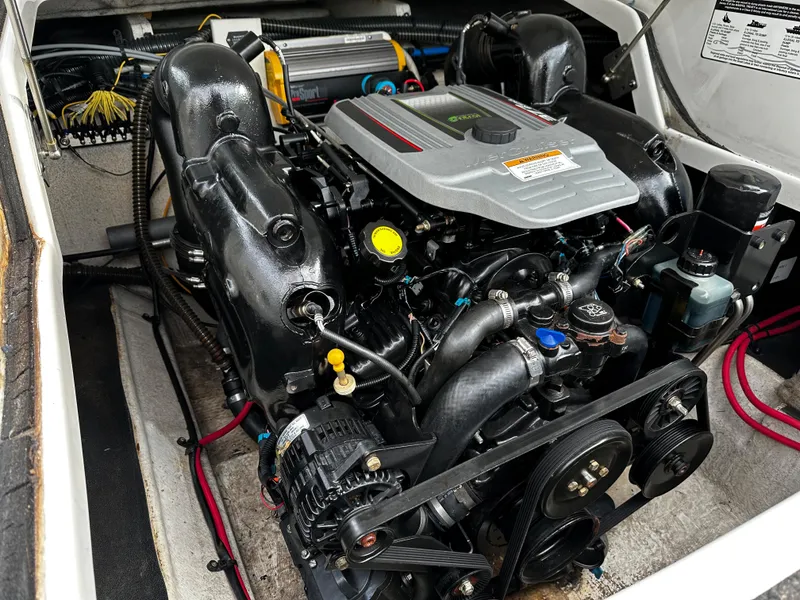 Slide: The Image of 2016 Crownline 285 SS boat engine compartment with detailed view of the engine. - 22