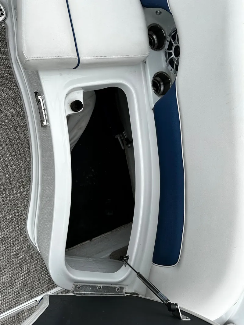 Slide: The Image of 2016 Crownline 285 SS boat interior storage compartment. - 28