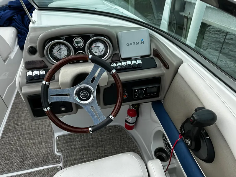 Slide: The Image of 2016 Crownline 285 SS boat dashboard with Garmin navigation system. - 39