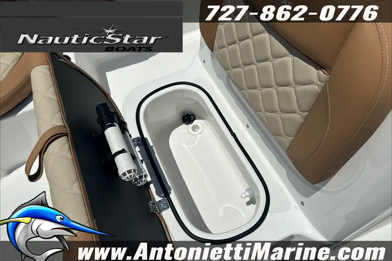 Slide: The Image of 2024 NauticStar 211 Hybrid boat interior with storage compartment and cushioned seating. - 21