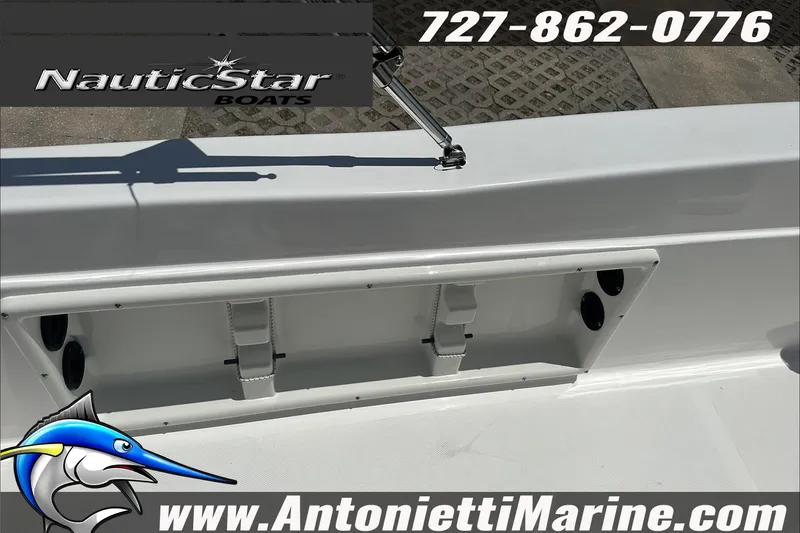 Slide: The Image of 2024 NauticStar 211 Hybrid boat detail with contact info and website. - 29