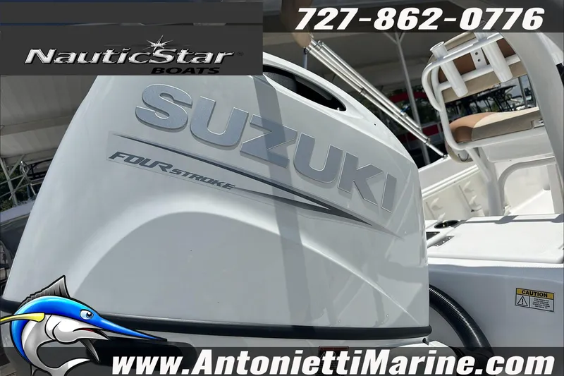Slide: The Image of 2024 NauticStar 211 Hybrid boat with Suzuki four-stroke engine, displayed at Antonietti Marine. - 9