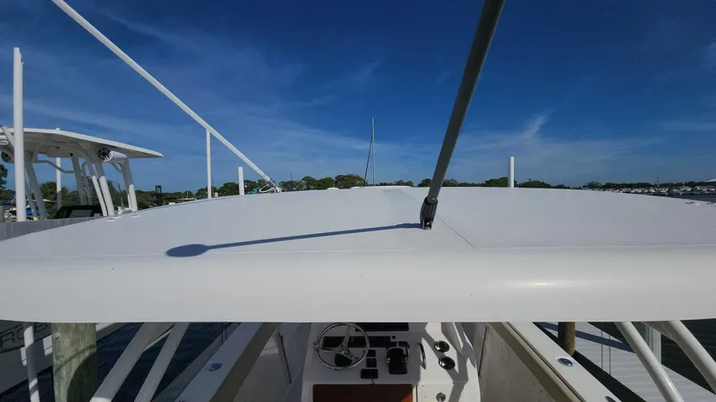 Slide: The Image of 2017 Pursuit S 280 Sport boat helm with clear blue sky background. - 22