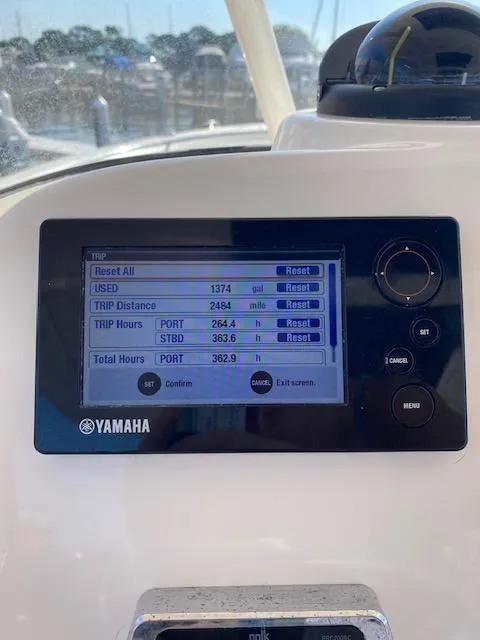 Slide: The Image of Yamaha display on 2017 Pursuit S 280 Sport boat showing trip and engine hours. - 3