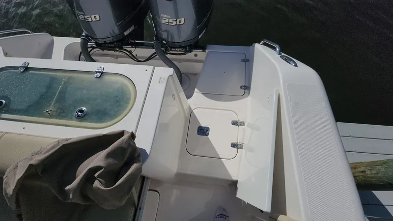 Slide: The Image of 2017 Pursuit S 280 Sport boat with twin 250 engines, deck view. - 34