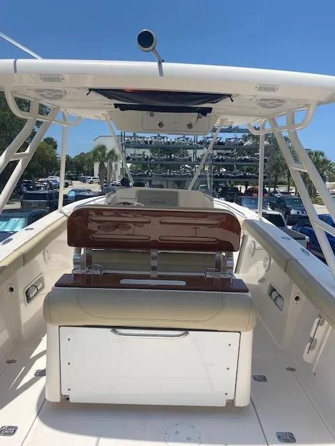 Slide: The Image of 2017 Pursuit S 280 Sport boat interior with seating and helm station. - 6