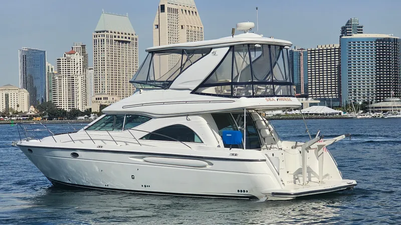 Slide: The Image of 2002 Maxum 4600 SCB Limited Edition yacht with city skyline. - 1