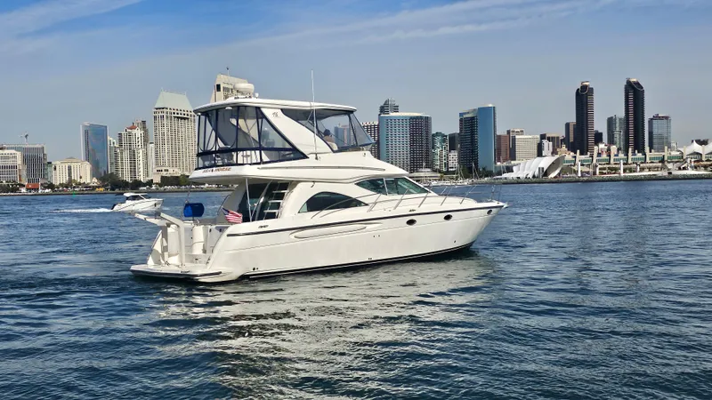 Slide: The Image of 2002 Maxum 4600 SCB Limited Edition yacht with city skyline. - 3