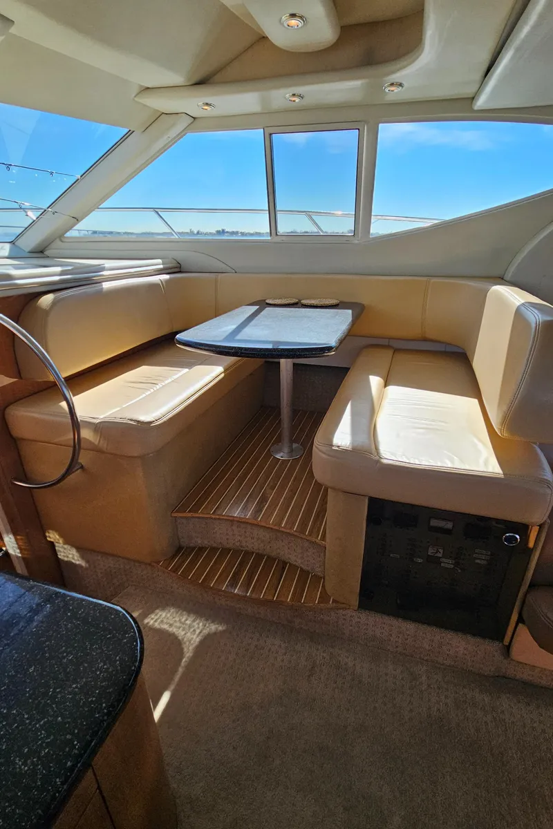 Slide: The Image of 2002 Maxum 4600 SCB yacht interior dining area. - 32