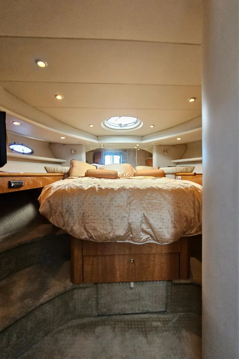 Slide: The Image of Luxurious bedroom in a 2002 Maxum 4600 SCB yacht. - 37