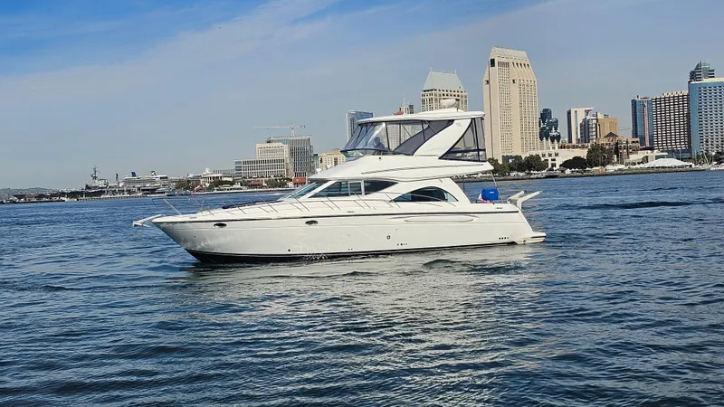 Slide: The Image of 2002 Maxum 4600 SCB Limited Edition yacht on the water. - 4