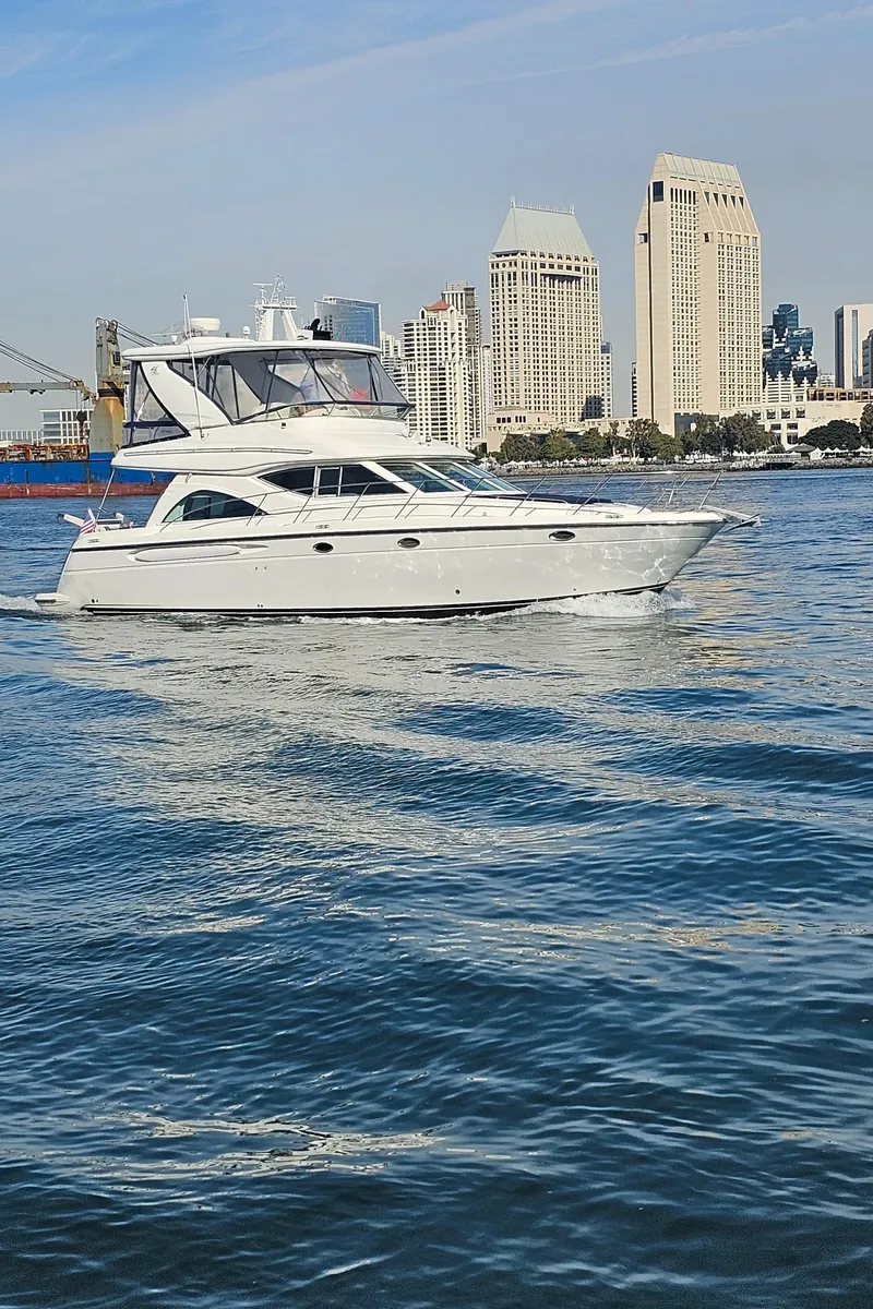 Slide: The Image of 2002 Maxum 4600 SCB Limited Edition yacht with city skyline. - 49