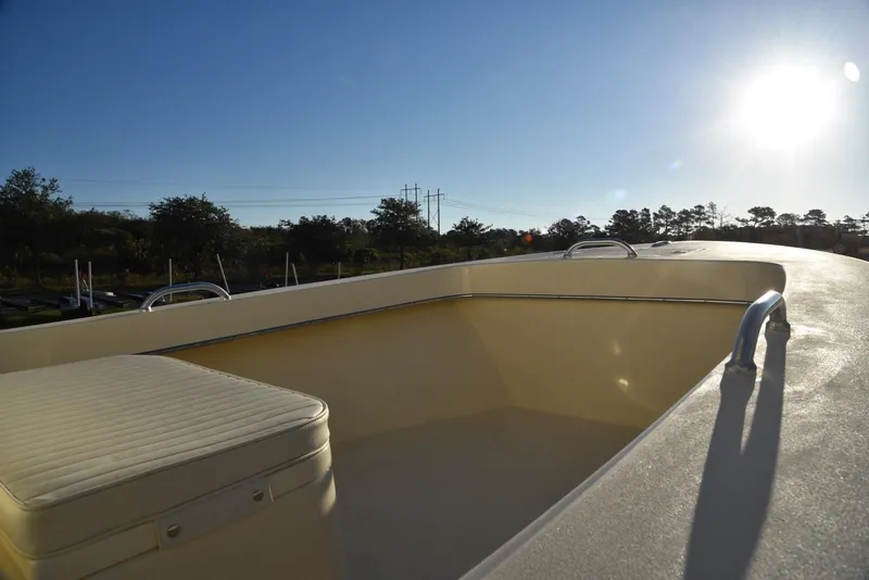 Slide: The Image of 2024 Jones Brothers Cape Fisherman 23 boat on trailer outside storage facility. - 13