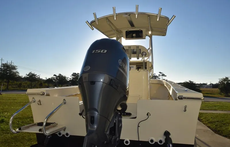 Slide: The Image of 2024 Jones Brothers Cape Fisherman 23 boat interior detail with rod holders. - 15