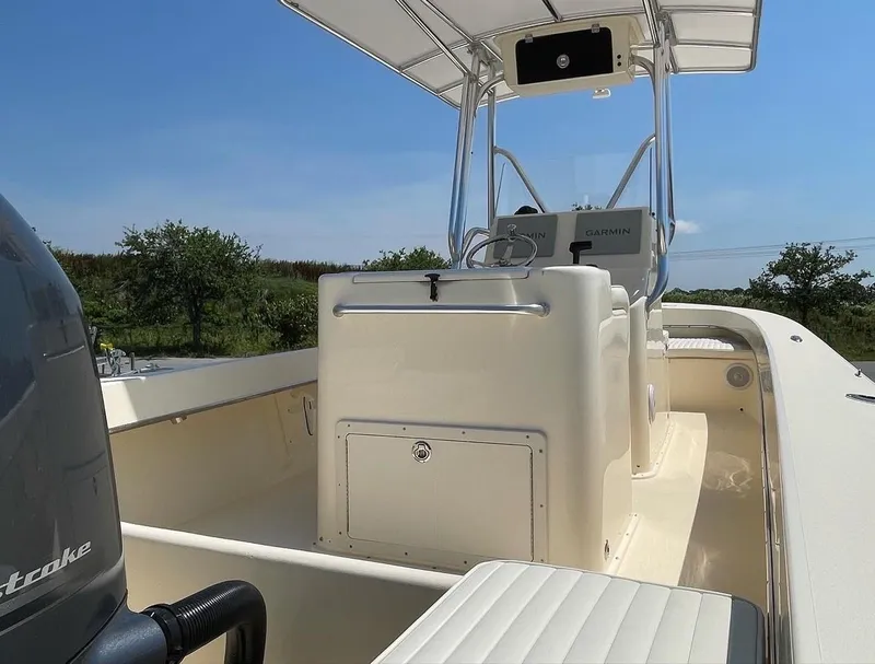 Slide: The Image of 2024 Jones Brothers Cape Fisherman 23 boat with 150 HP outboard motor. - 16