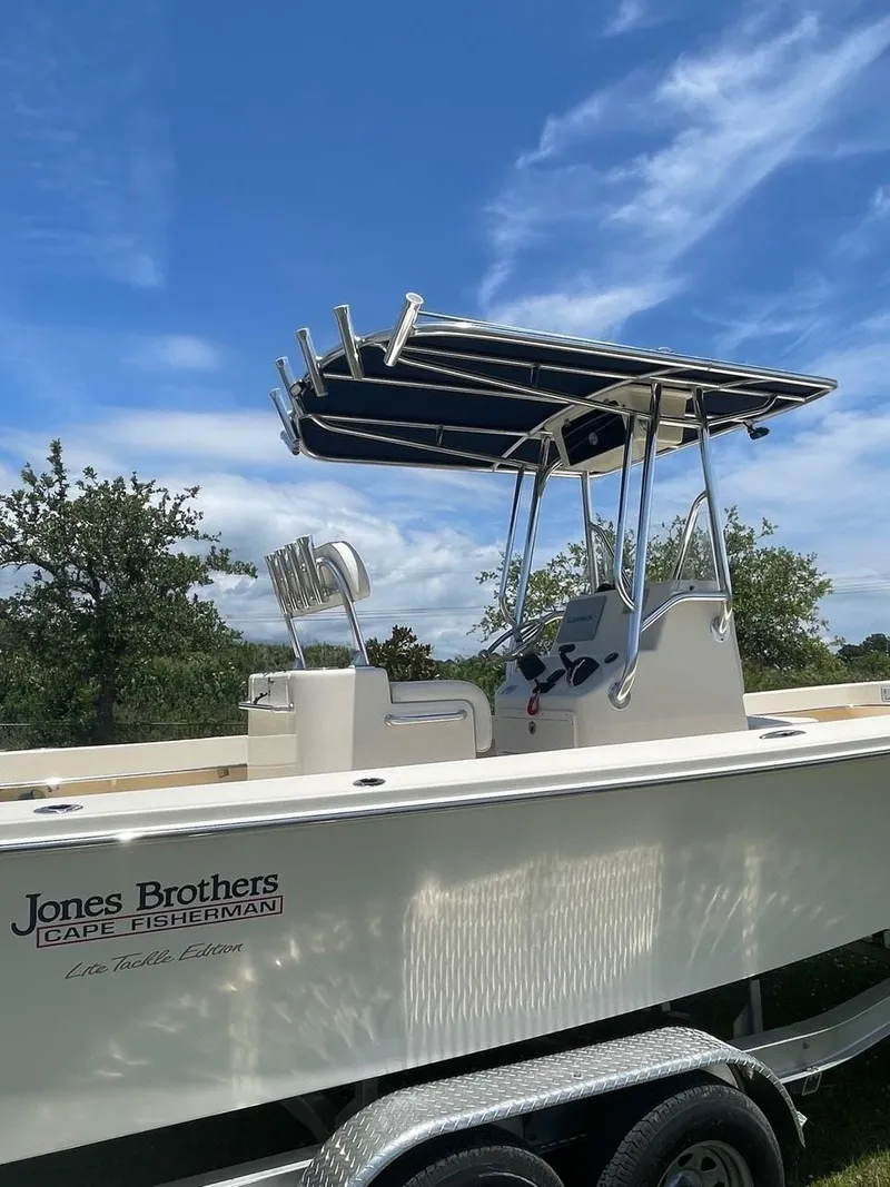 Slide: The Image of 2024 Jones Brothers Cape Fisherman 23 with Yamaha 250 V6 outboard motor. - 24