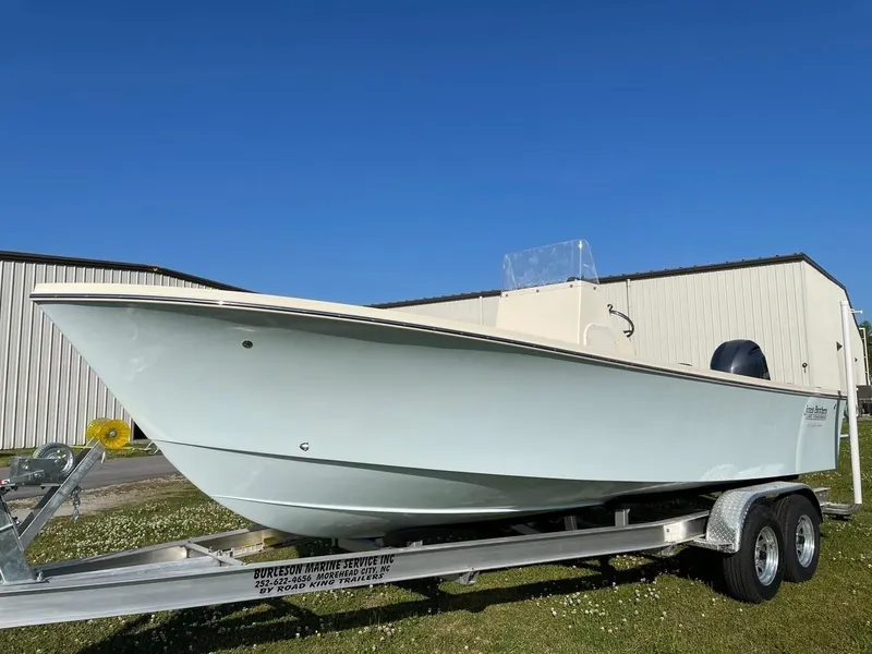 Slide: The Image of 2024 Jones Brothers Cape Fisherman 23 boat on a trailer. - 32