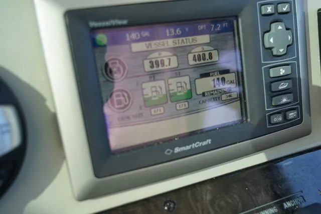 Slide: The Image of SmartCraft display on 2010 Sea Ray 470 Sundancer showing vessel status and fuel levels. - 10