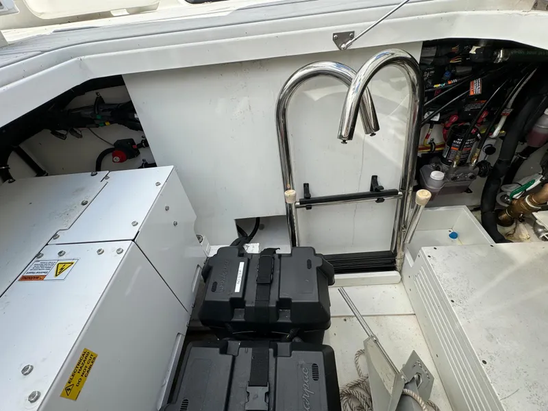 Slide: The Image of 2019 HCB Siesta engine compartment with batteries and equipment. - 39