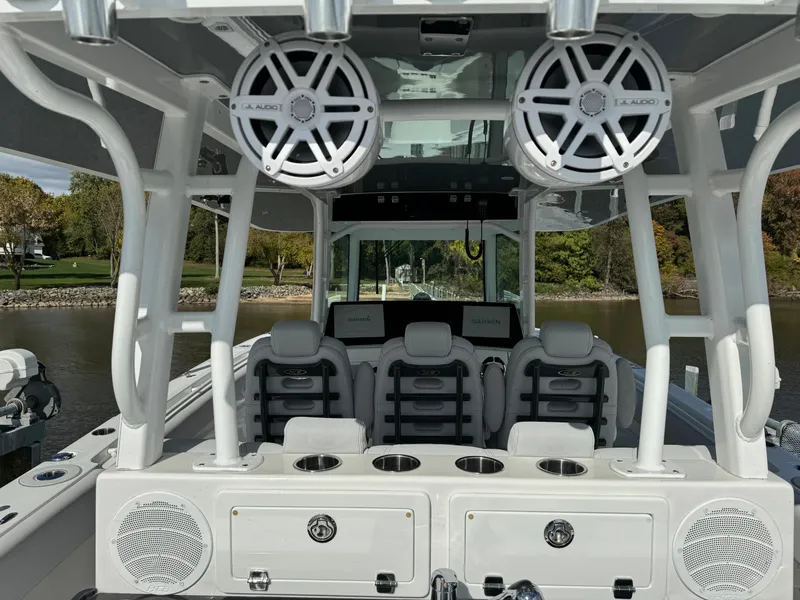 Slide: The Image of 2019 HCB Siesta boat interior with seating and audio system. - 15