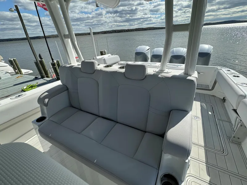 Slide: The Image of 2019 HCB Siesta boat with spacious seating and scenic water view. - 19