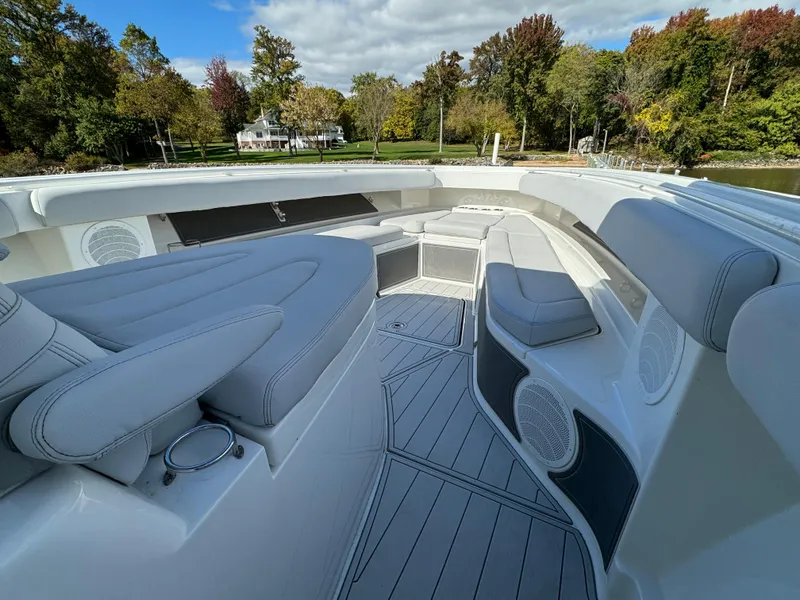 Slide: The Image of 2019 HCB Siesta boat with spacious seating and scenic background. - 20