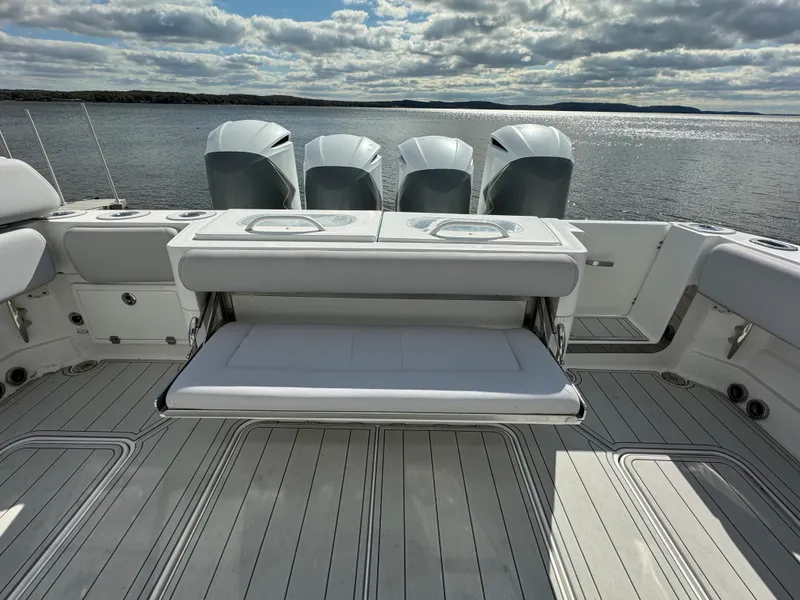 Slide: The Image of 2019 HCB Siesta boat with quad outboard engines and spacious deck. - 37
