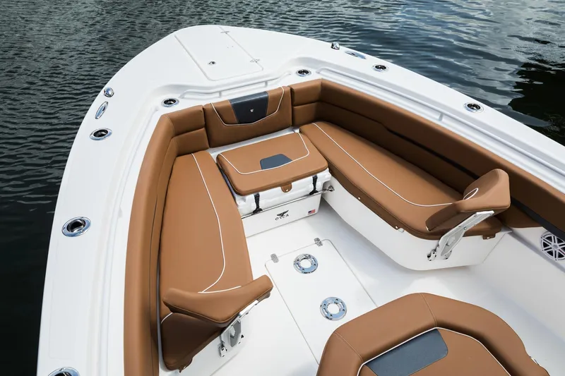 Slide: The Image of 2024 Wellcraft 302 Fisherman boat with tan seating and white deck. - 33