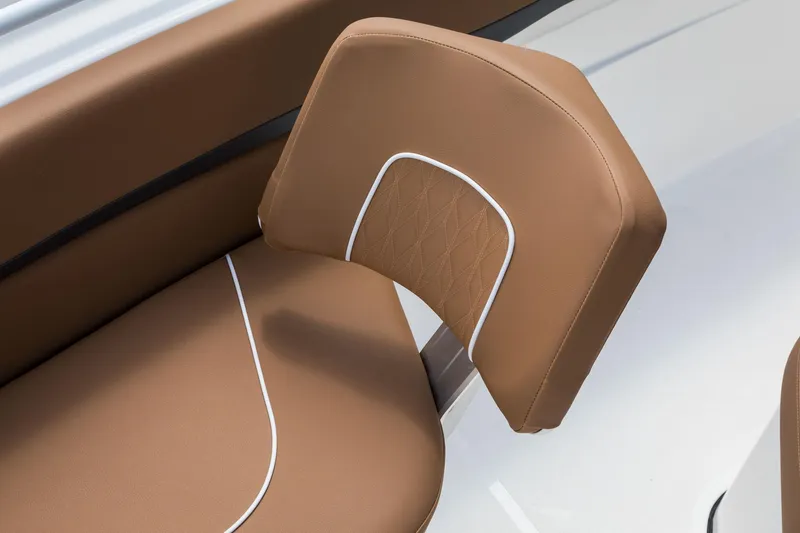 Slide: The Image of 2024 Wellcraft 302 Fisherman brown cushioned seating detail. - 34