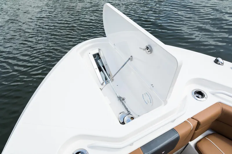 Slide: The Image of 2024 Wellcraft 302 Fisherman boat with open storage compartment. - 35