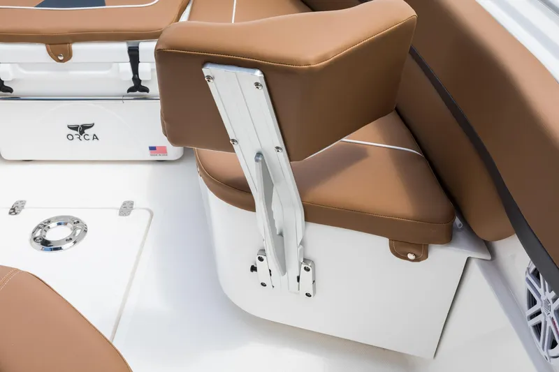 Slide: The Image of 2024 Wellcraft 302 Fisherman boat with brown cushioned seating and Orca logo. - 36