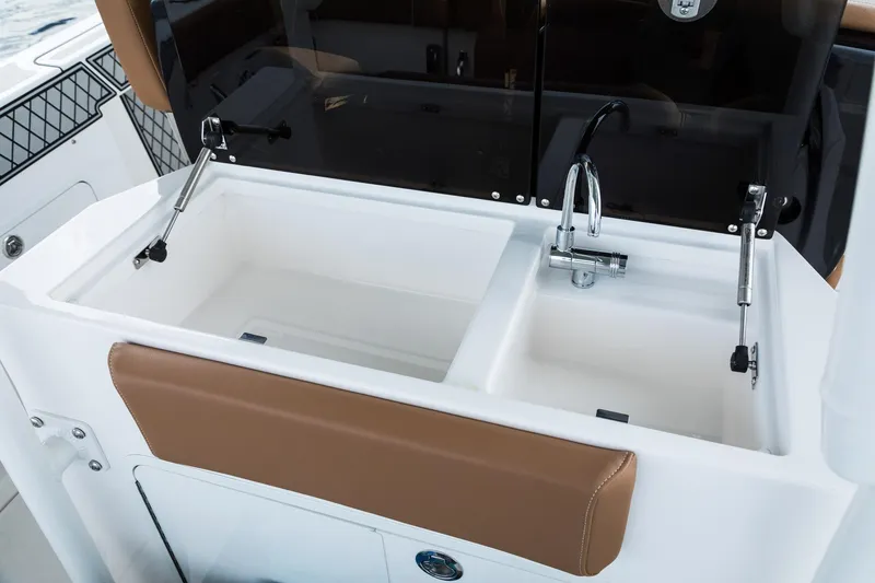 Slide: The Image of 2024 Wellcraft 302 Fisherman boat sink and prep station - 44