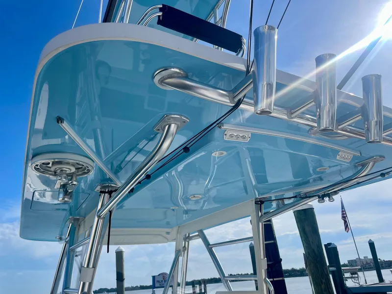 Slide: The Image of 2019 Invincible 39 Open Fisherman boat with blue hull and stainless steel fittings. - 10
