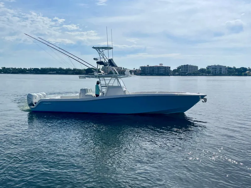 Slide: The Image of 2019 Invincible 39 Open Fisherman boat on calm water. - 21