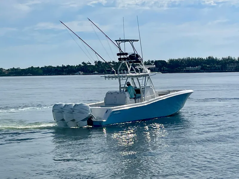 Slide: The Image of 2019 Invincible 39 Open Fisherman boat cruising on calm waters. - 22
