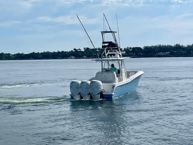 Slide: The Image of 2019 Invincible 39 Open Fisherman boat cruising on calm waters. - 23