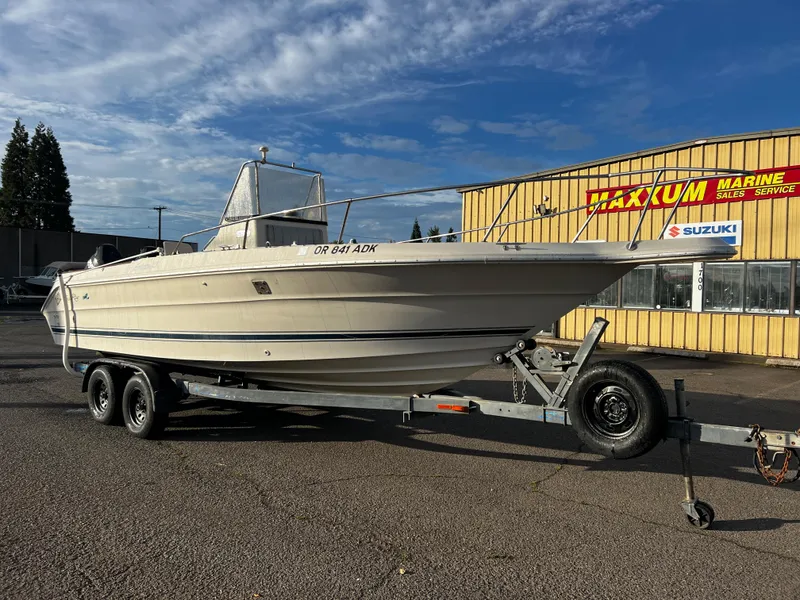 The Image of 1988 Sea Ray Laguna 23 boat on trailer at Maxum Marine dealership. - 0