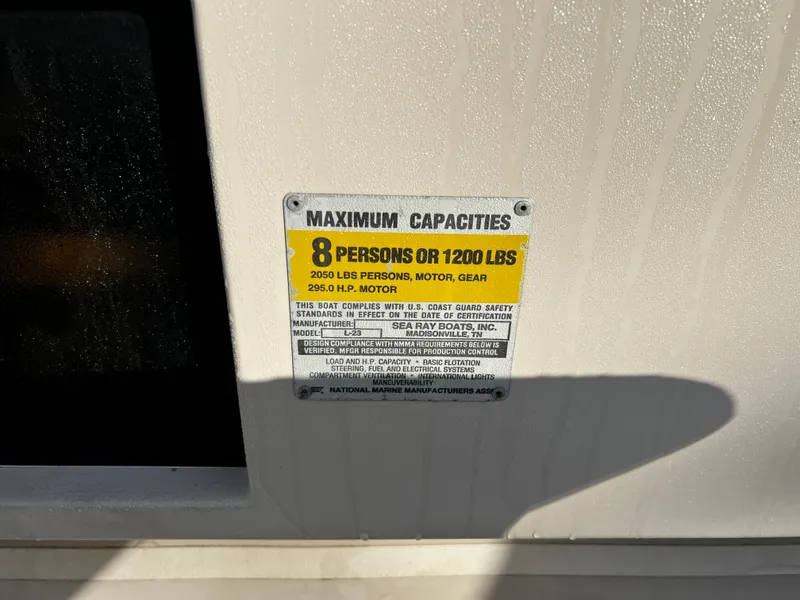 Slide: The Image of 1988 Sea Ray Laguna 23 capacity plate, maximum 8 persons or 1200 lbs. - 12