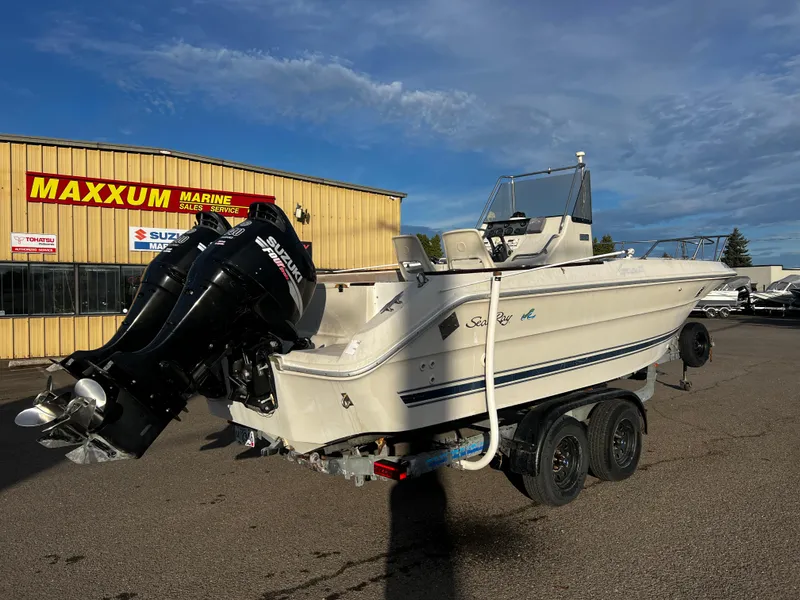 Slide: The Image of 1988 Sea Ray Laguna 23 boat on trailer at Maxxum Marine dealership. - 2