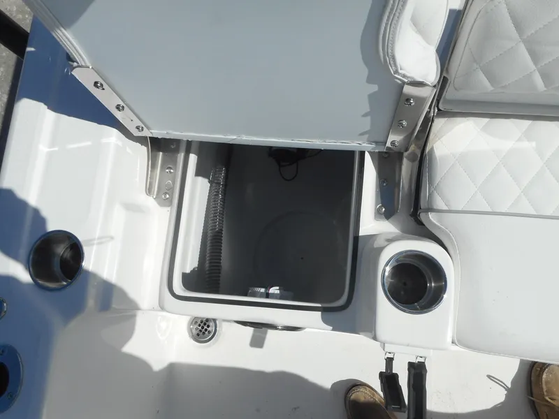 Slide: The Image of 2024 Sea Fox 251 BAYFOX boat storage compartment and seating area. - 10