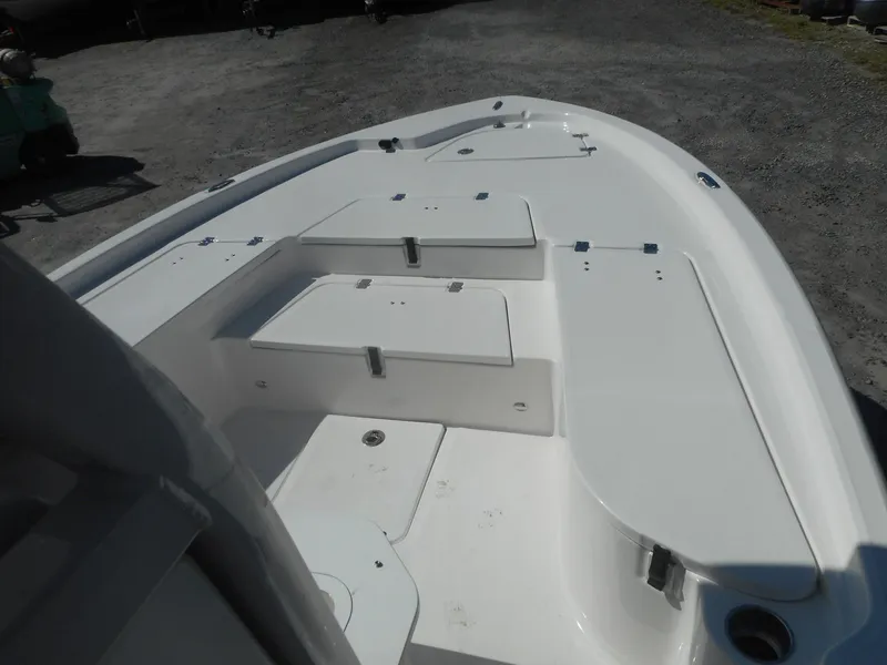 Slide: The Image of 2024 Sea Fox 251 BAYFOX boat deck with storage compartments. - 12