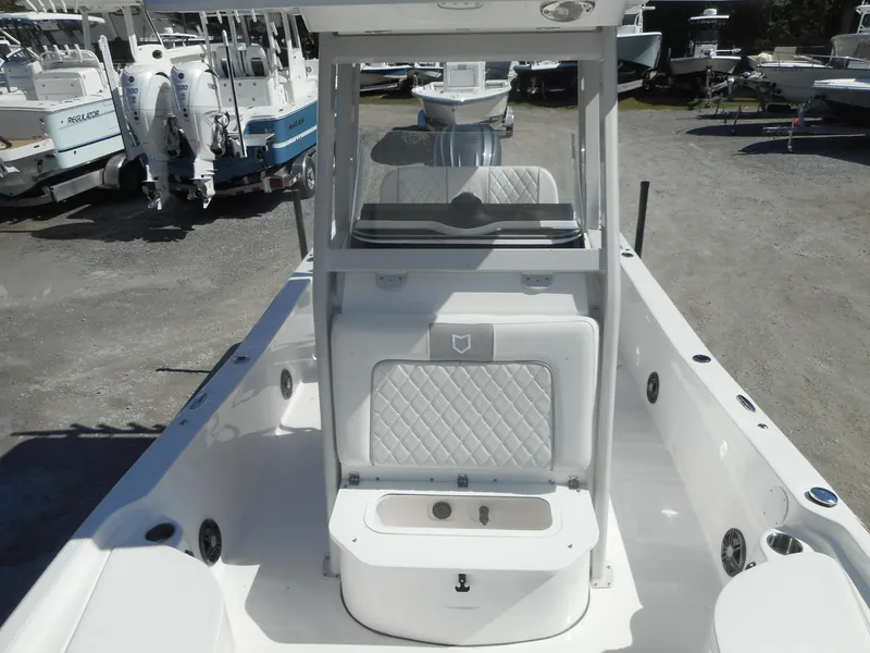 Slide: The Image of 2024 Sea Fox 251 BAYFOX boat interior with seating and storage compartments. - 14