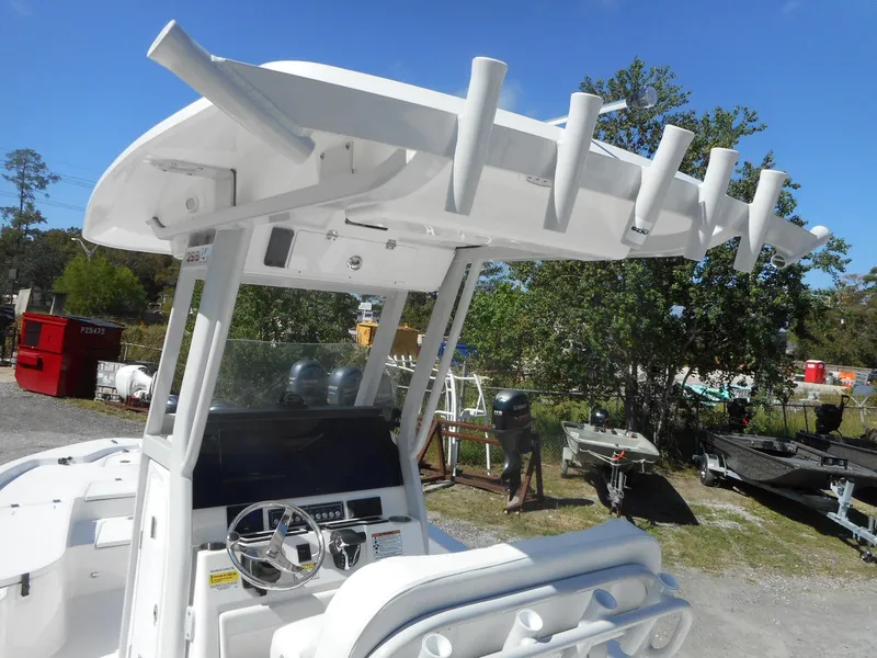 Slide: The Image of 2024 Sea Fox 251 BAYFOX center console boat with T-top and rod holders. - 21