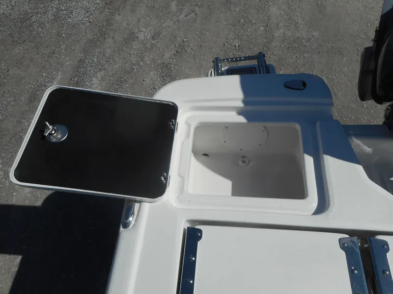 Slide: The Image of 2024 Sea Fox 231 BAYFOX boat storage compartment with open lid. - 16