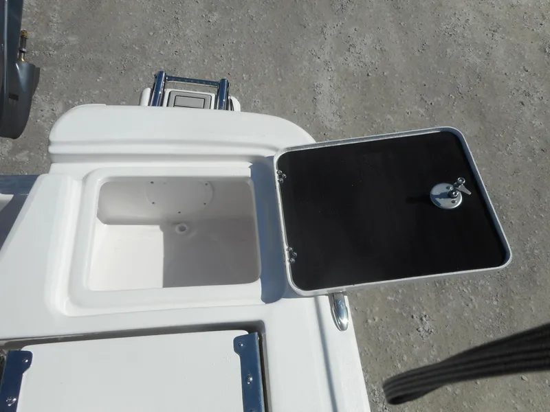 Slide: The Image of Open storage compartment on a 2024 Sea Fox 231 BAYFOX boat. - 17